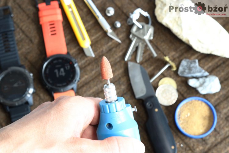 Царапаем  стекло часов Garmin Fenix 6X шлифовальным камнем